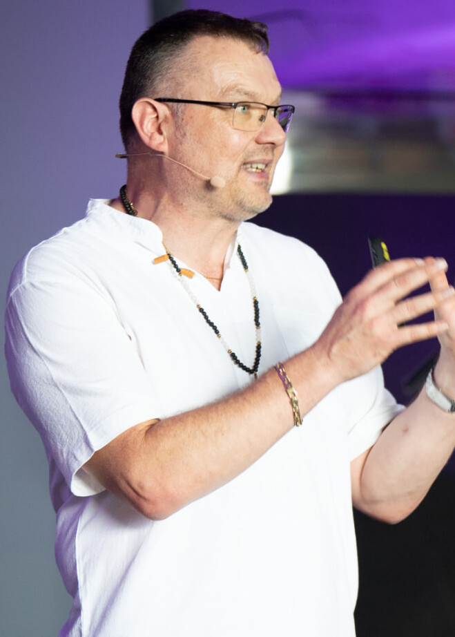 Jay Allen, keynote speaker, speaking on stage